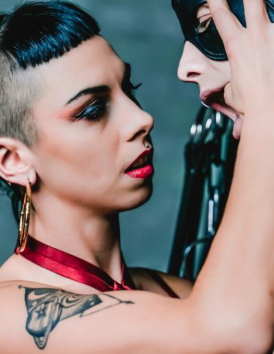 dominatrix in bdsm and bondage session